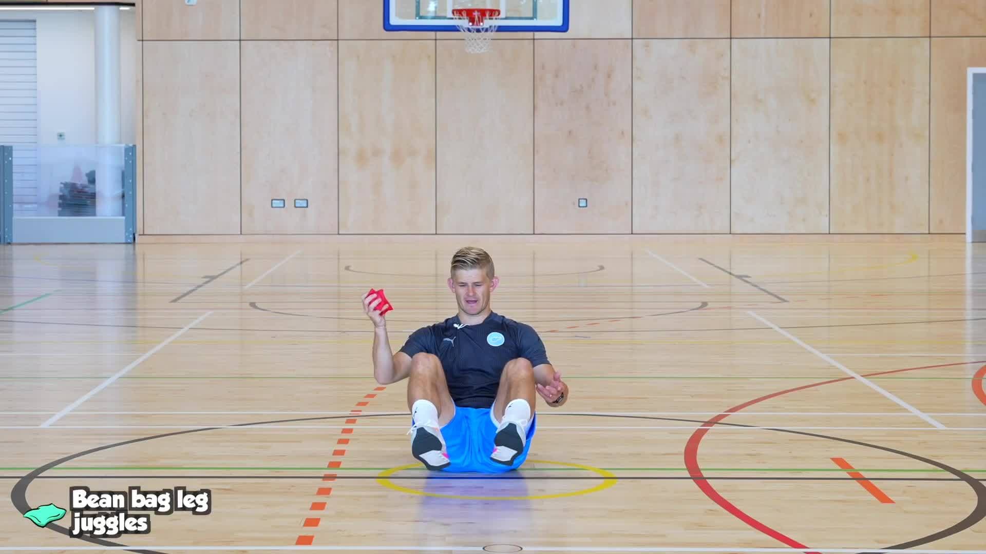 Throwing & Catching - Bean bag leg juggles