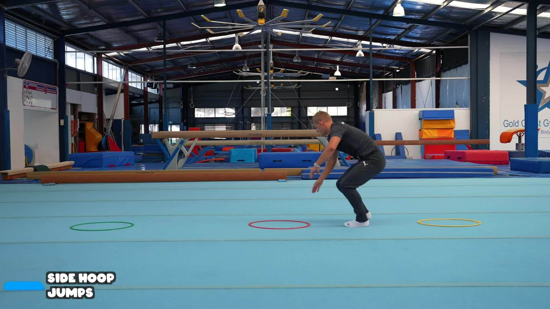 Elementary gymnastics - Floor mats - 6 side hoop jumps
