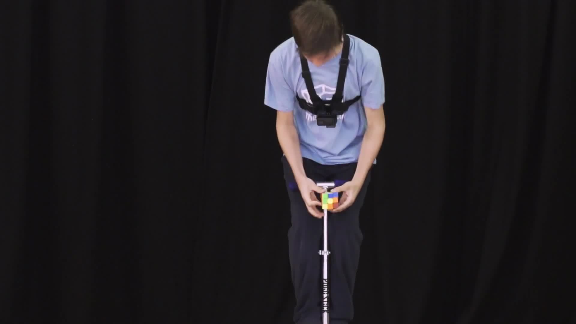 World Record Attempt: Solving Rubik's Cube on a Pogo Stick